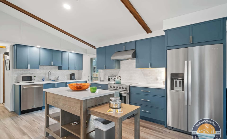 Our fully equipped, modern kitchen features stainless steel appliances and ample counter space. Whether prepping family snacks or a holiday meal, you’ll find everything you need in this clean, bright space.