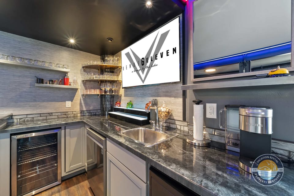 Well-stocked bar with glass shelving