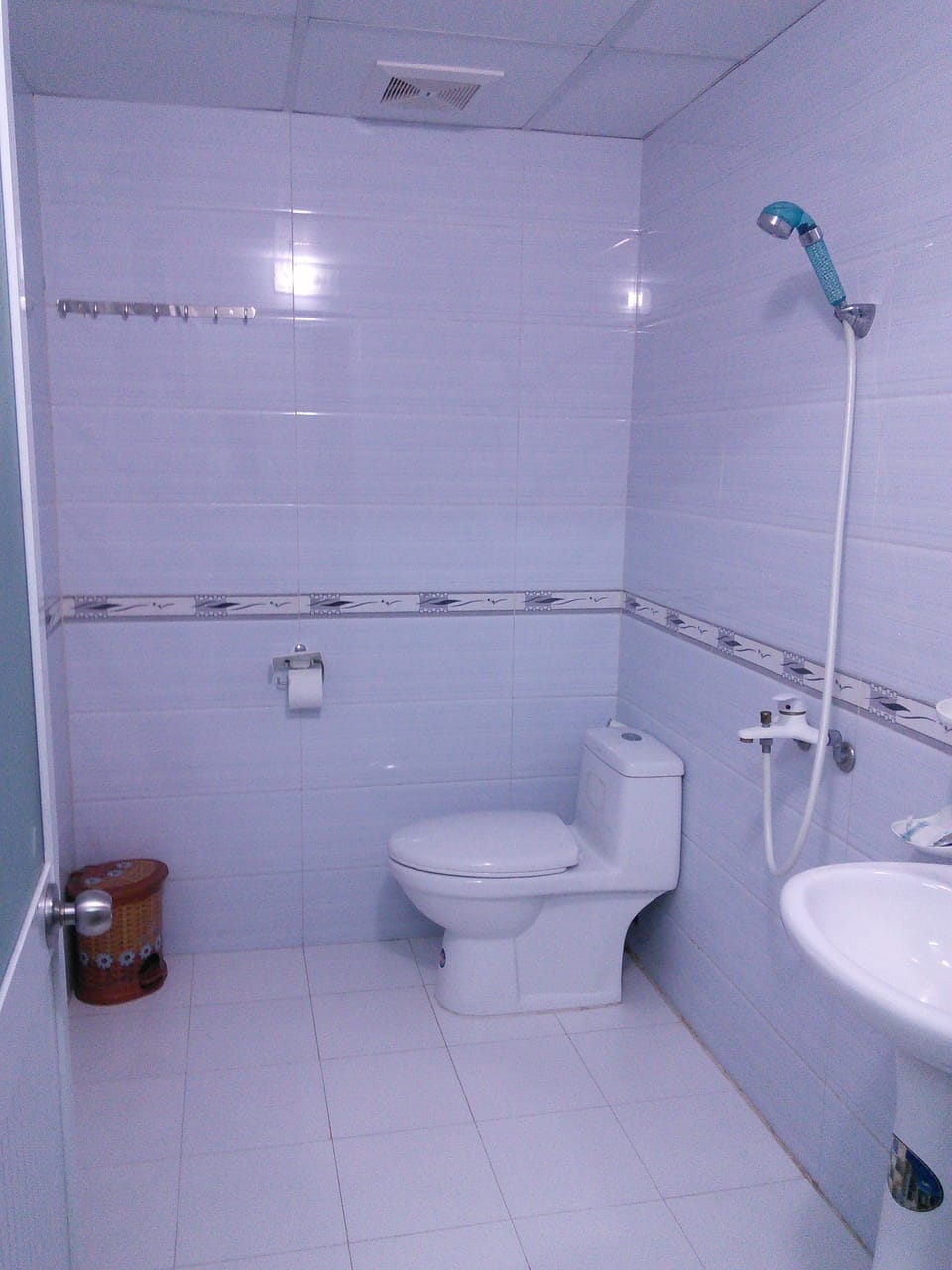 Shower, free toiletries, slippers, towels