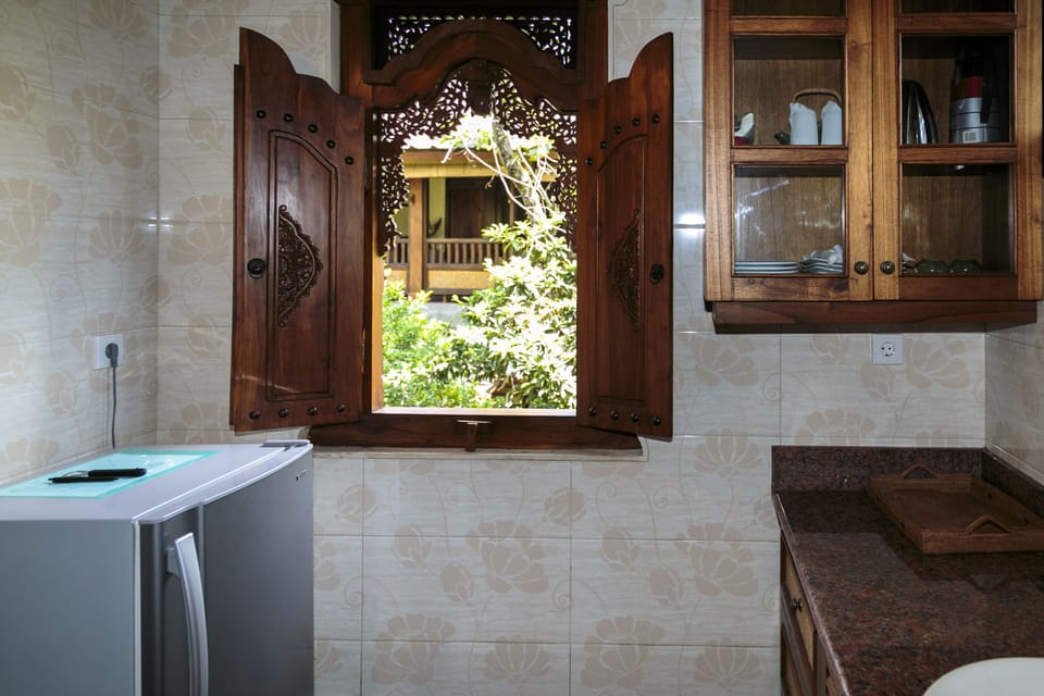 Sawo Apartment 2 | Private kitchenette | Coffee/tea maker, highchair