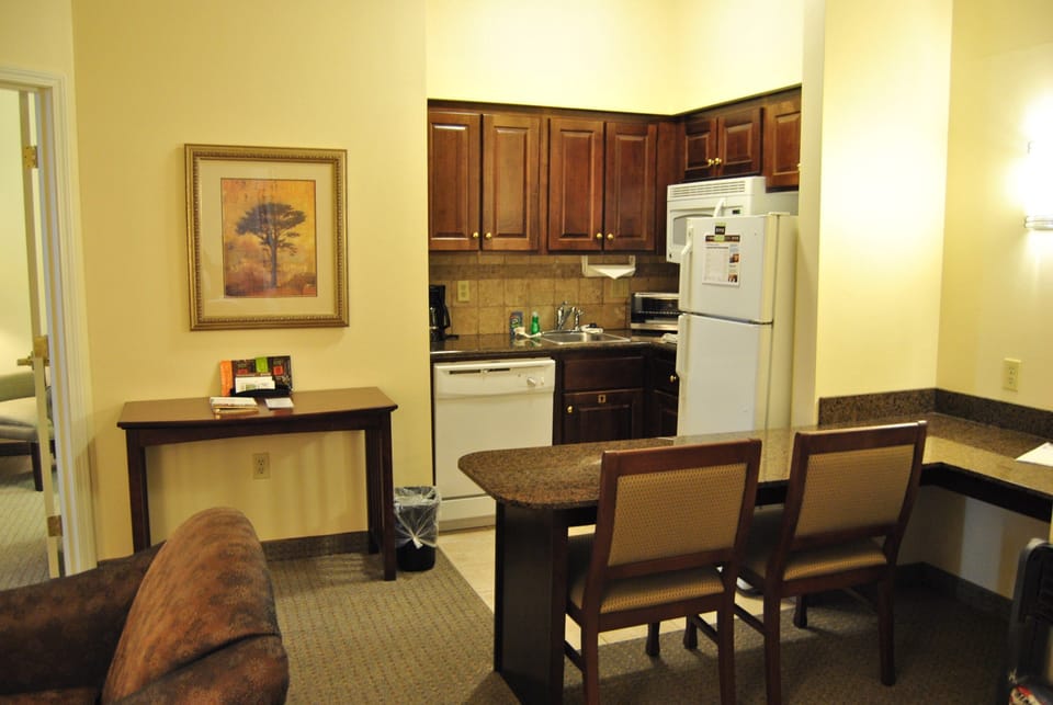 Cook up your favorite meals in this fully-equipped kitchen, complete with modern appliances and ample counter space.