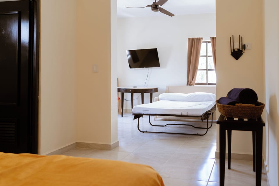 Suite, Multiple Beds | Living room