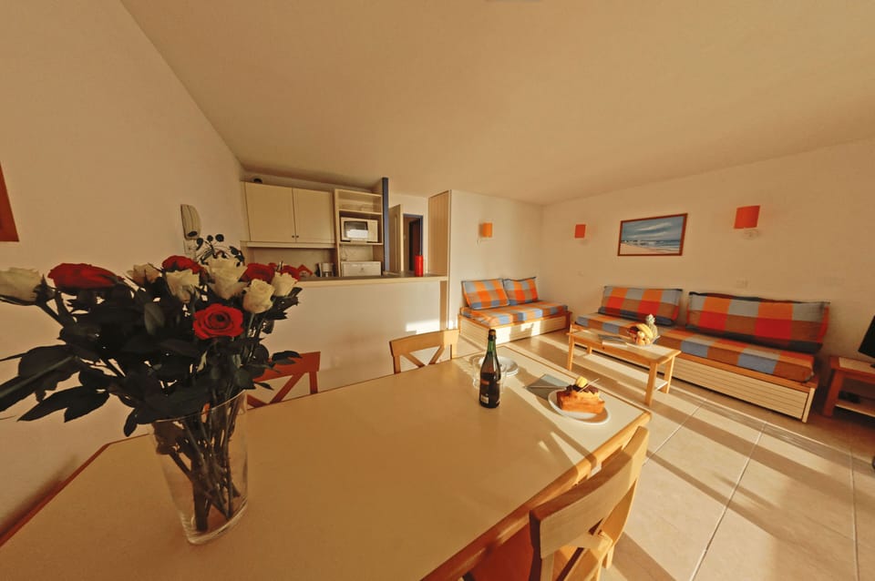 Enjoy the warmth of natural light as it fills this inviting space, perfect for gathering with loved ones.