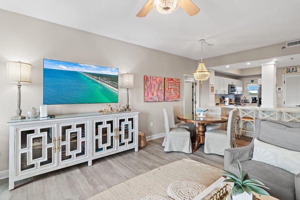 Tops'l Summit 405 has comfortable living room furniture (including a queen sleeper sofa), 65" Smart TV, Views of Tops'l State Park and Partial Views of the Gulf of Mexico