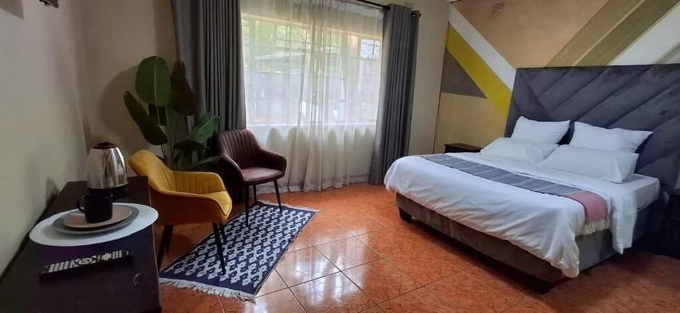 Deluxe Room | In-room safe, desk, laptop workspace, iron/ironing board