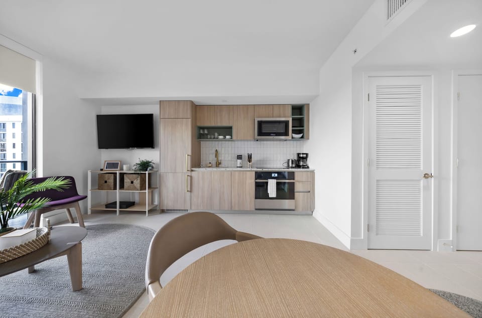 Condo, Balcony, City View | Private kitchen | Espresso maker, toaster, toaster oven, cookware/dishes/utensils