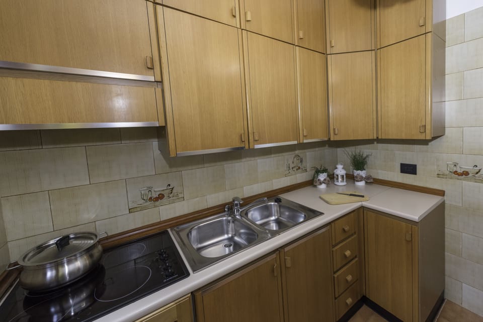 Apartment, 2 Bedrooms | Private kitchen | Full-size fridge, microwave, stovetop, dishwasher