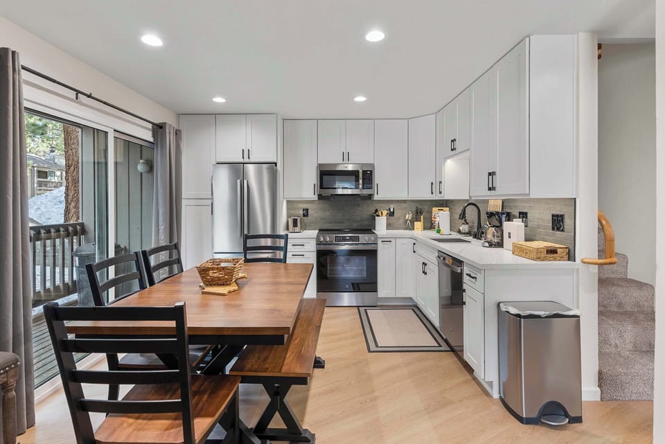Sleek kitchen with stainless appliances.
