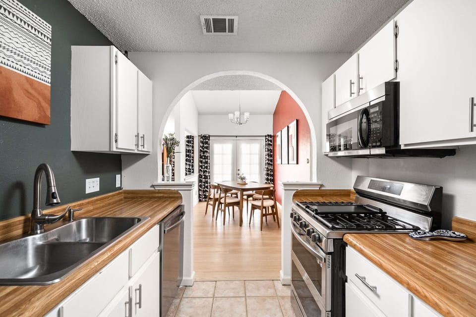 Cook and connect in a bright, inviting kitchen that flows effortlessly into the dining space. It’s designed for easy meals, shared moments, and feeling completely at home.