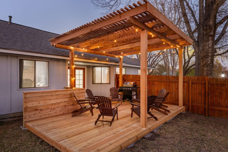 Gather under the soft glow of string lights, where evenings slow down and conversations linger long after sunset. Whether grilling or unwinding with a drink, this private outdoor space invites you to savor every moment.