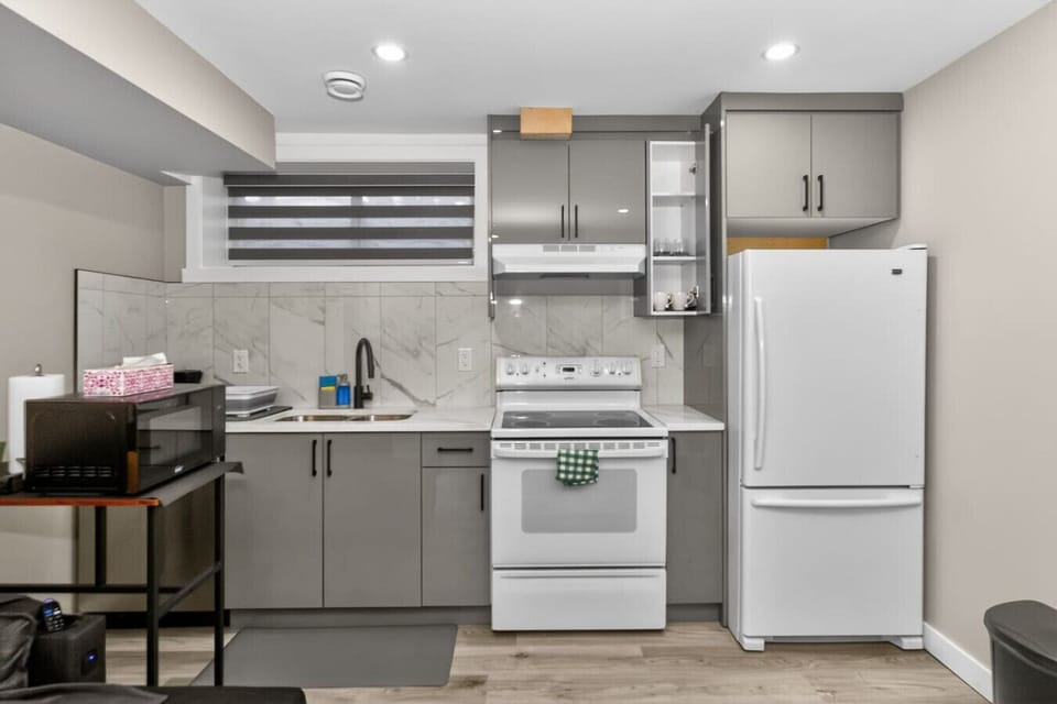 Fully equipped kitchen with essential appliances
