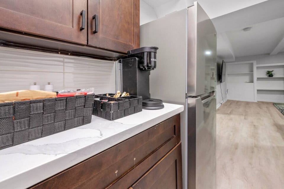 Open-concept kitchen and dining space with modern appliances.