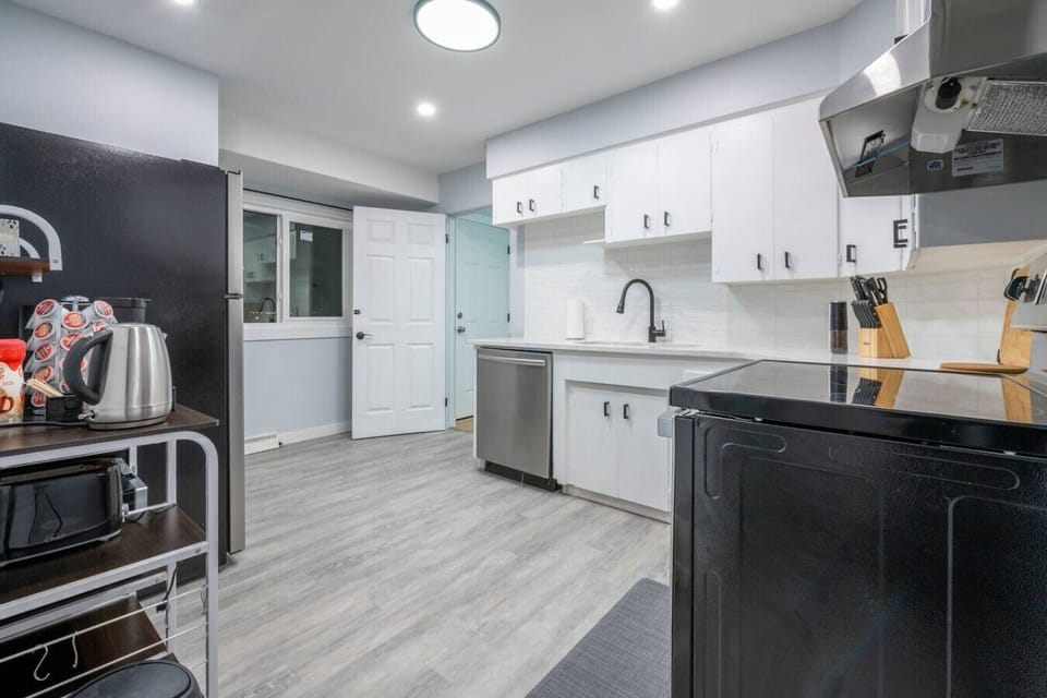 Bright kitchen with full appliances and convenient layout.