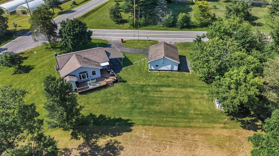Aerial view of the home and outbuilding