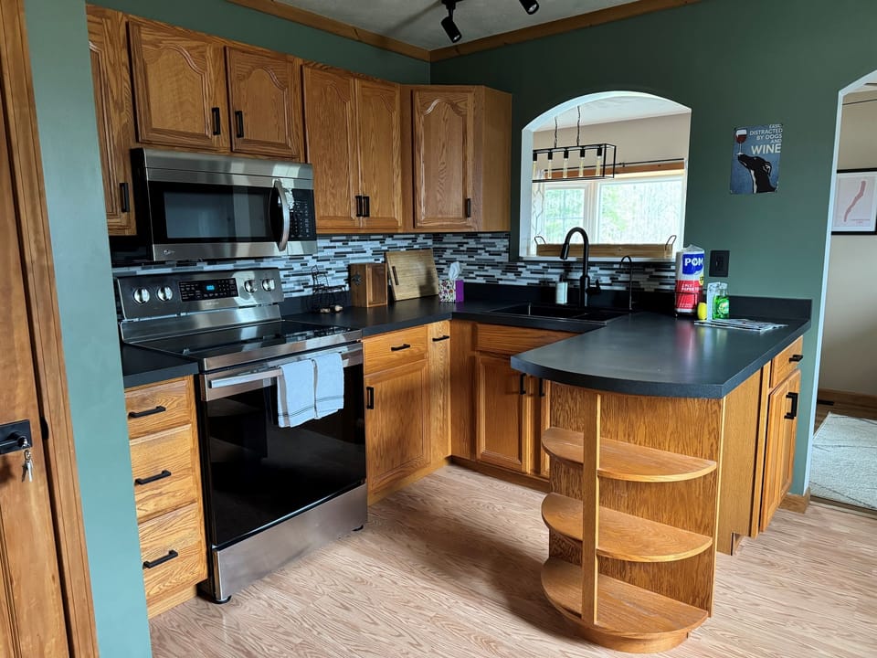 Kitchen with island and wooden cabinetry