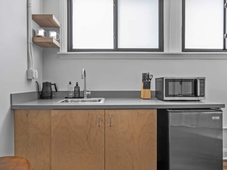 Bright, modern kitchenette with all the essentials for a comfy stay.