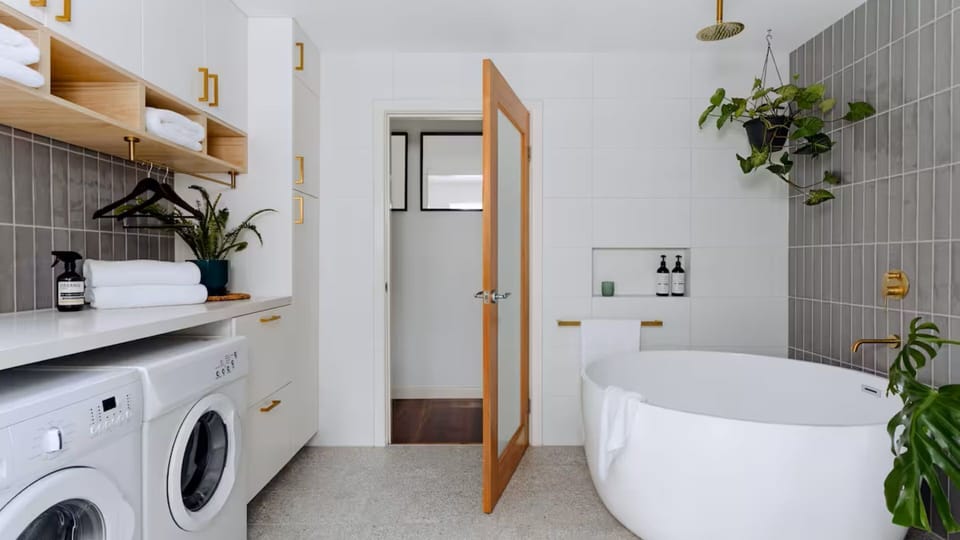 Functional laundry and bathroom amenities for convenience