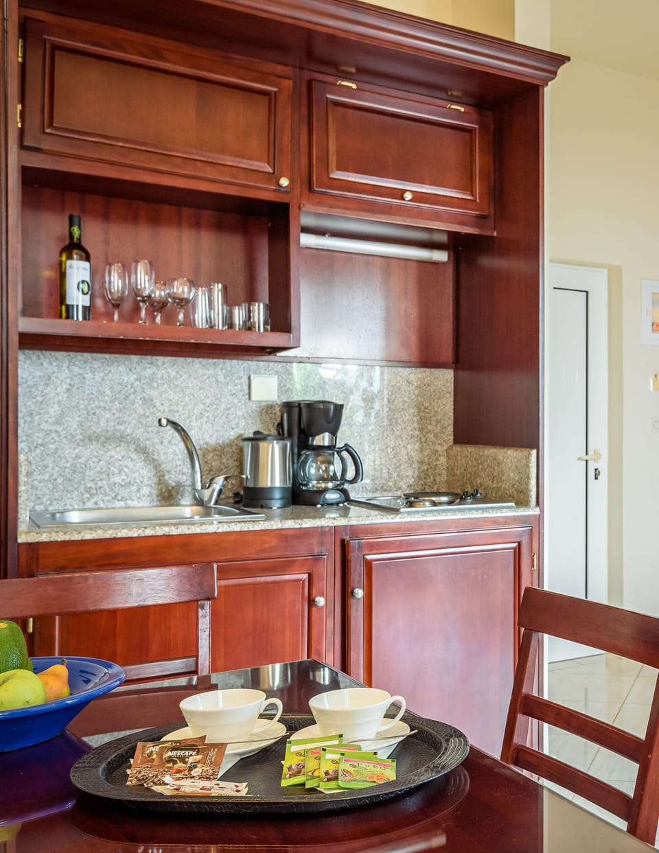 Fridge, stovetop, coffee/tea maker, electric kettle