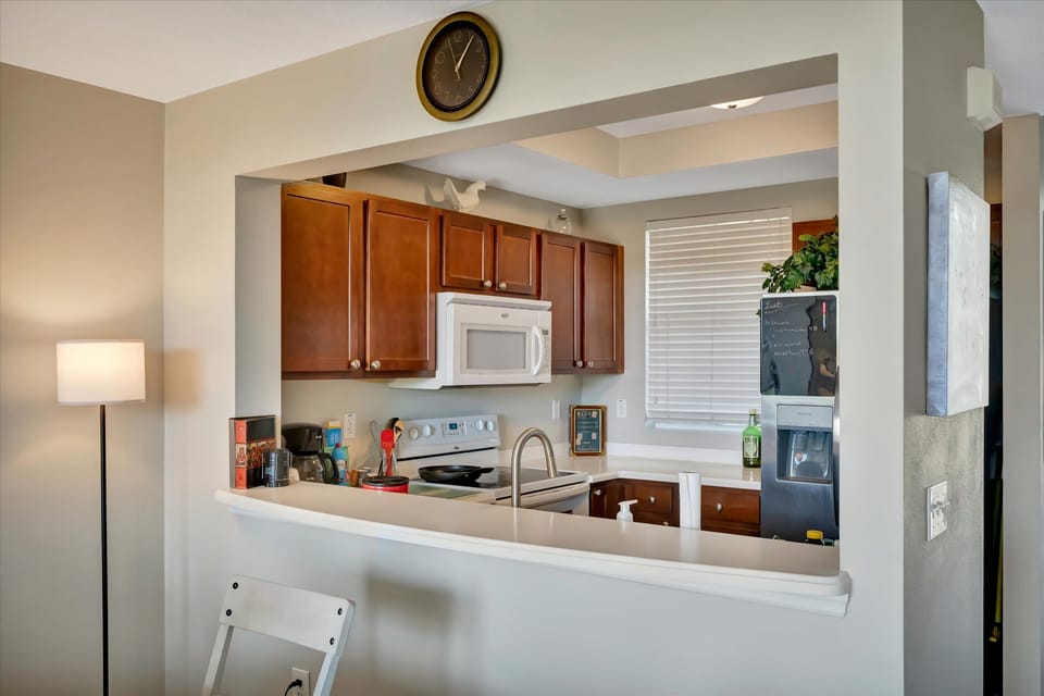 Kitchen pass-through connected to the dining area