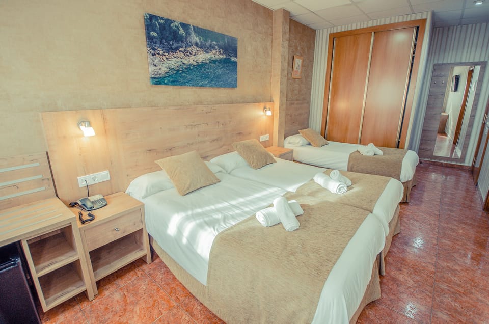 Triple Room | Blackout drapes, soundproofing, iron/ironing board, cribs/infant beds