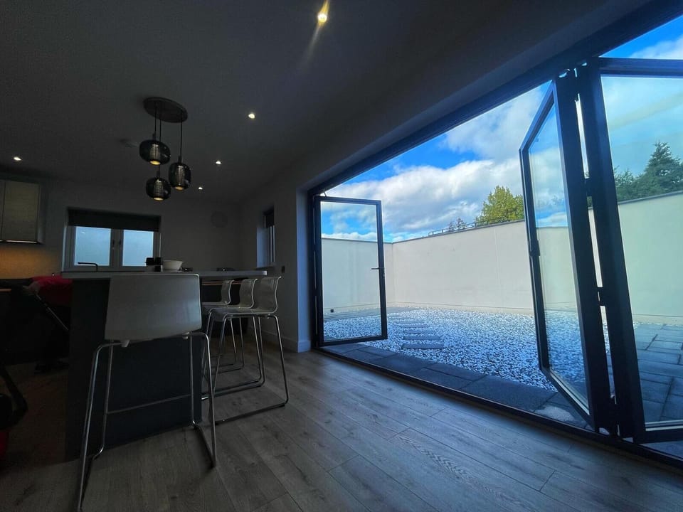 patio door, leading too enclosed garden space