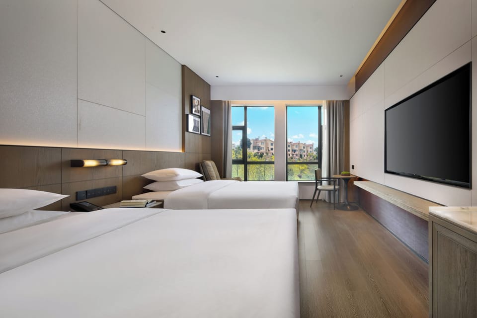 Premium Twin Room, Garden View | Premium bedding, pillowtop beds, minibar, in-room safe
