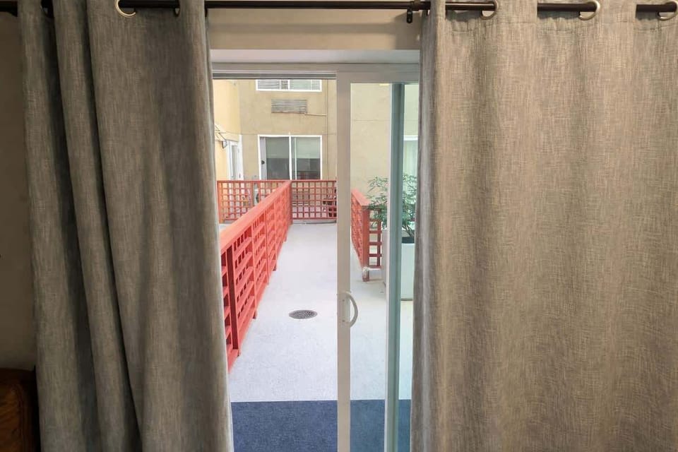 Walk outside to your own balcony in our cool complex!