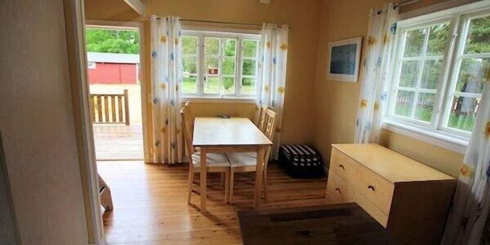 Cottage, 2 bedrooms (sheets/cleaning not included) | Living area | 32-inch TV with satellite channels