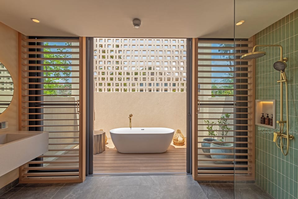 Beachfront Pool Villa Suite | Bathroom amenities | Eco-friendly toiletries, hair dryer, bathrobes, slippers