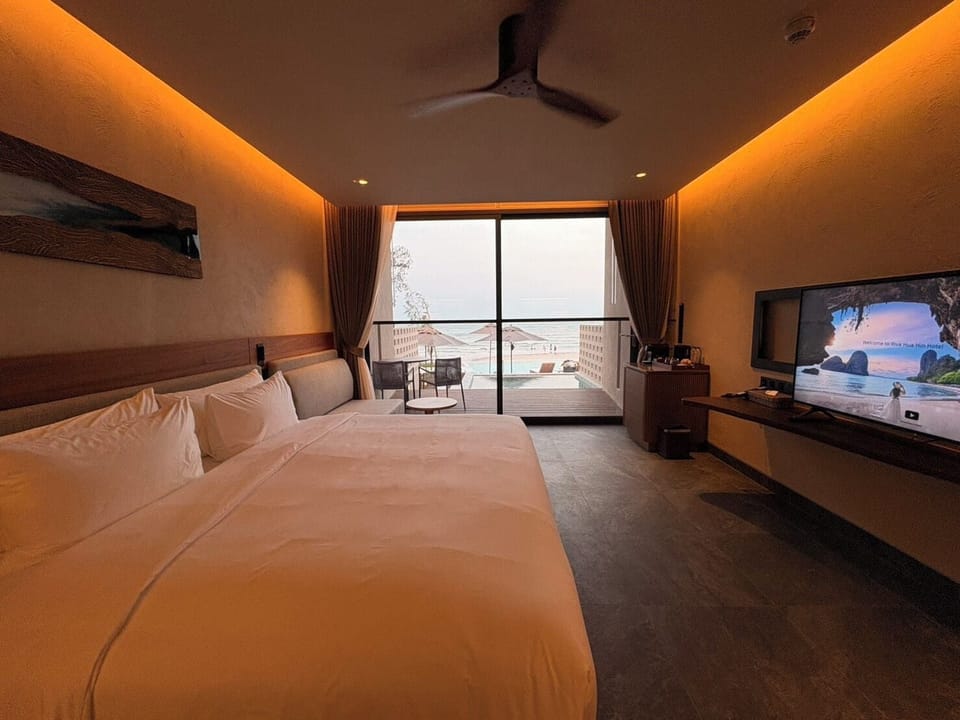 Beachfront Pool Villa Suite | Minibar, in-room safe, blackout drapes, free WiFi