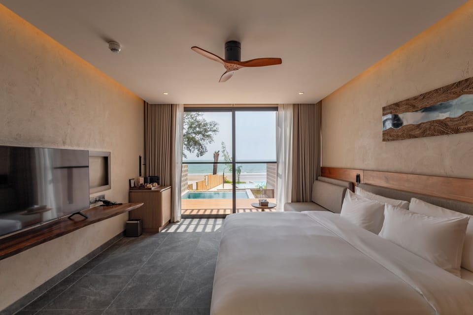 Beachfront Pool Villa Suite | Minibar, in-room safe, blackout drapes, free WiFi