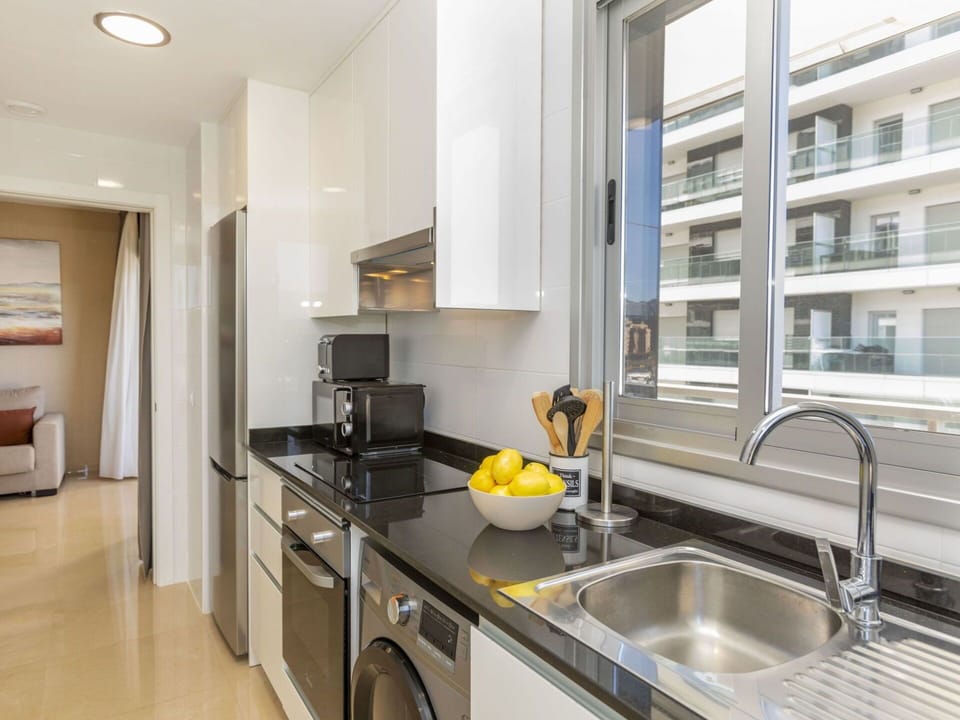 Countertop, Kitchen, Flooring, Interior Design, Major Appliance, Floor, Cabinetry, Apartment, Kitchen Appliance, Furniture