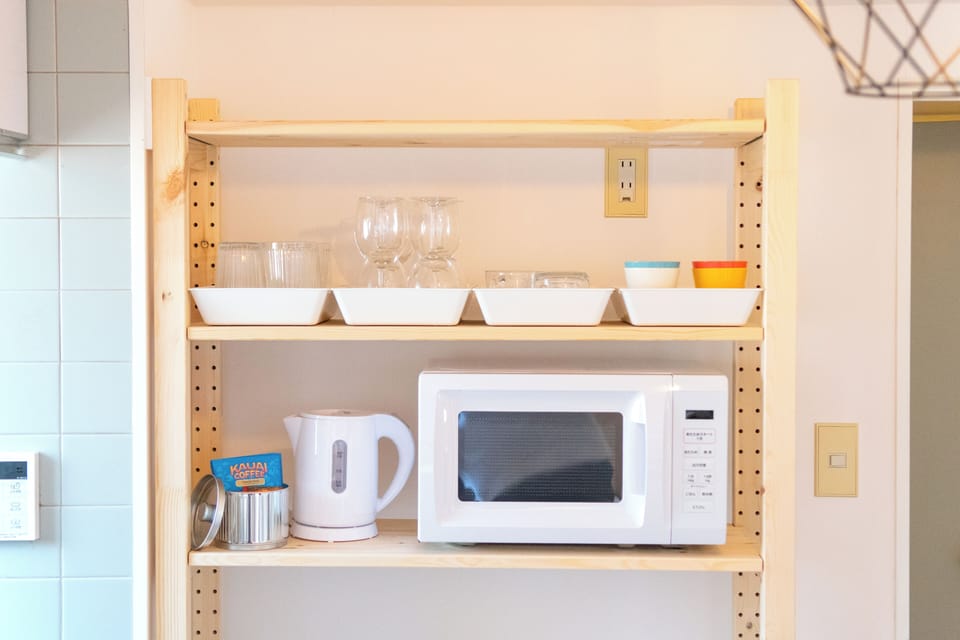 Apartment | Private kitchen | Full-size fridge, microwave, stovetop, cookware/dishes/utensils