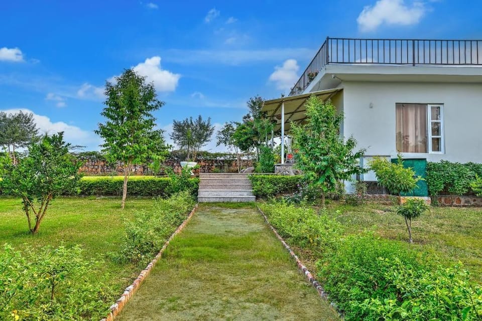 Deluxe Villa, Balcony, Garden View | Property grounds