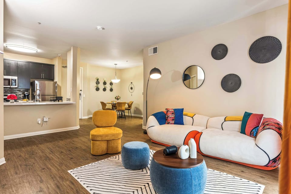 Thoughtfully designed living room with comfortable furniture, warm tones, and a layout that feels both open and inviting.