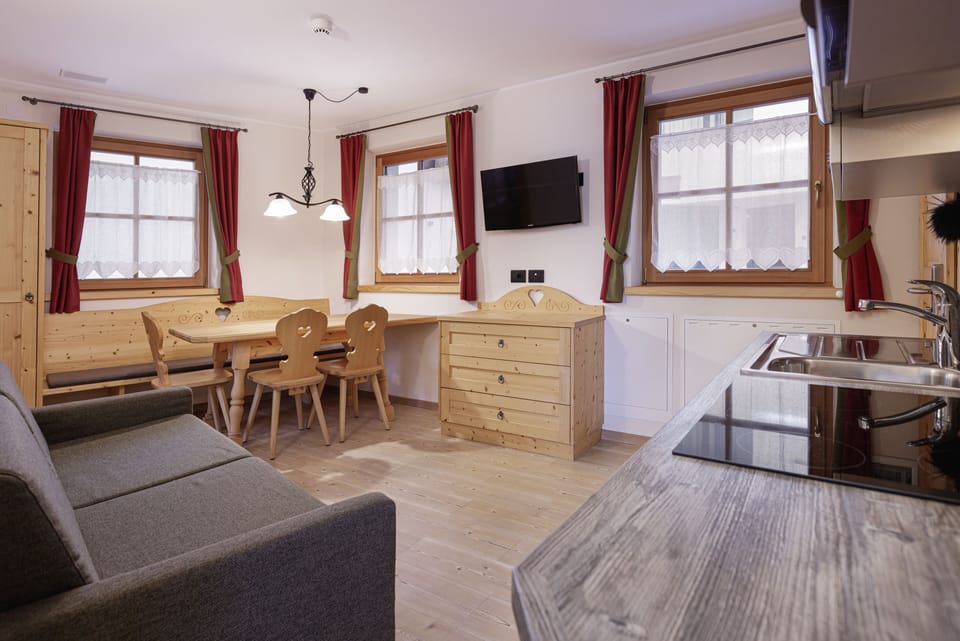 Family Apartment, 2 Bedrooms | Living area | Flat-screen TV