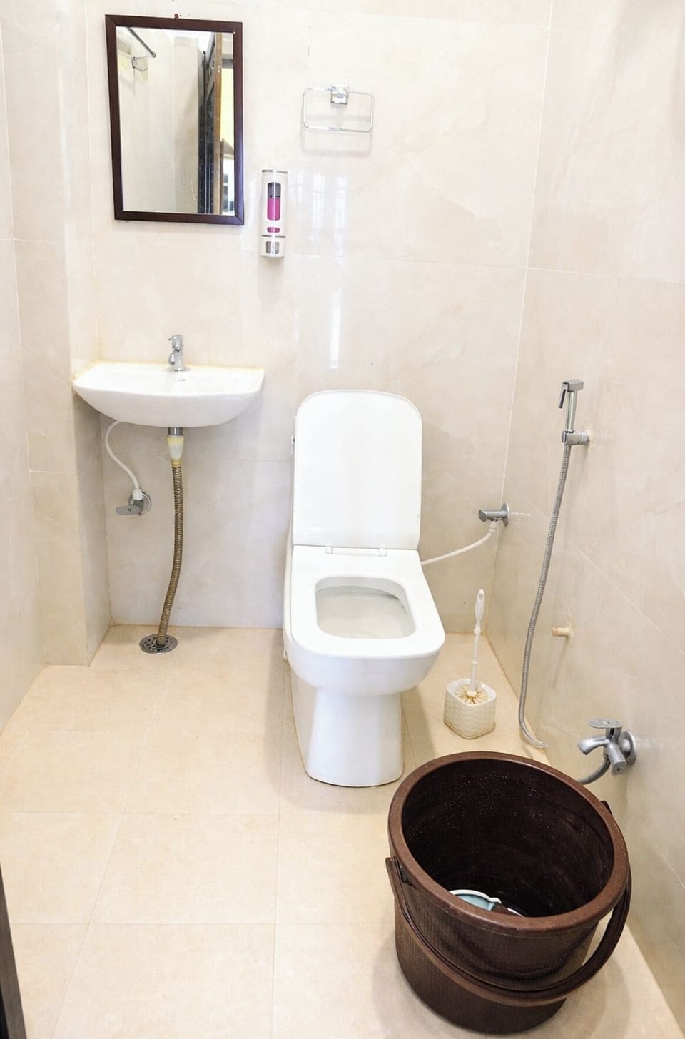 Shower, rainfall showerhead, slippers, towels