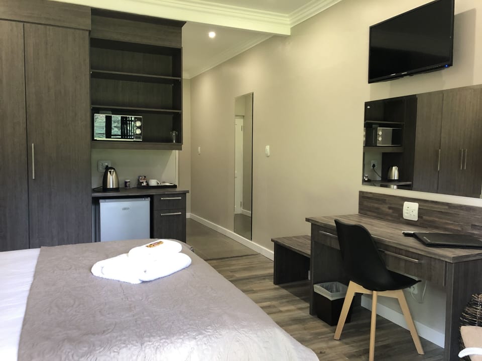 Luxury Double Room Single Use, Patio, Garden View | Free minibar, in-room safe, laptop workspace, blackout drapes