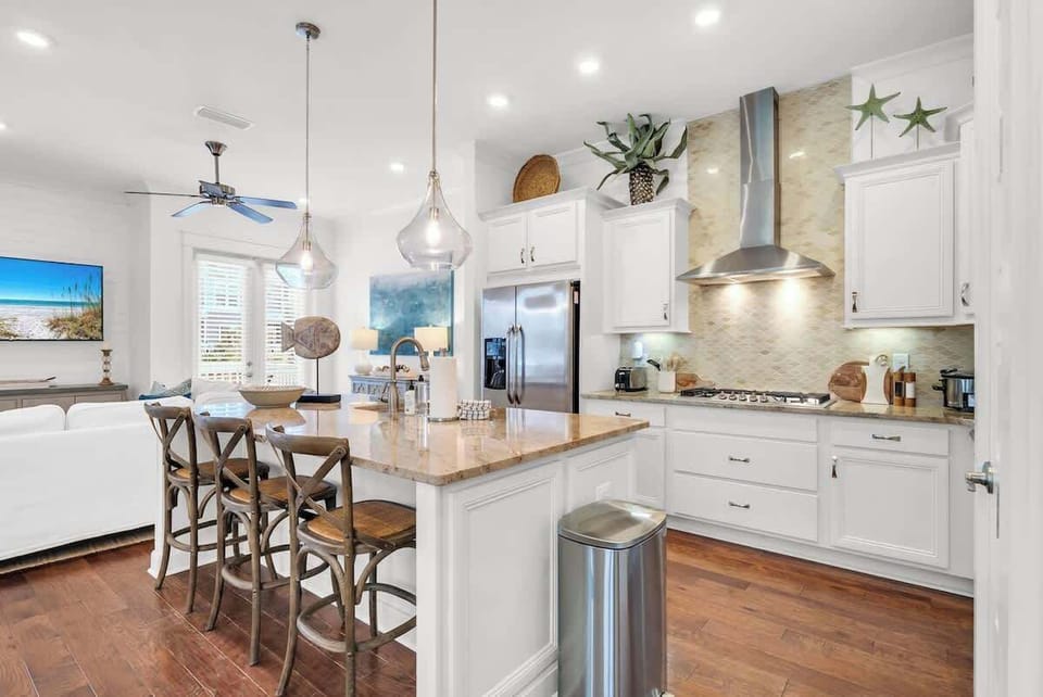 Large kitchen island includes seating for 3.