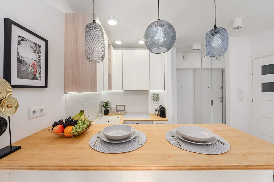 Comfort Apartment, City View | Private kitchen | Dining tables