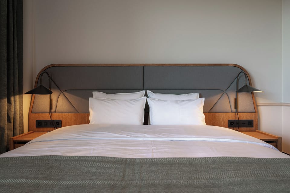 Superior Double Room, Garden View | Minibar, in-room safe, iron/ironing board, bed sheets