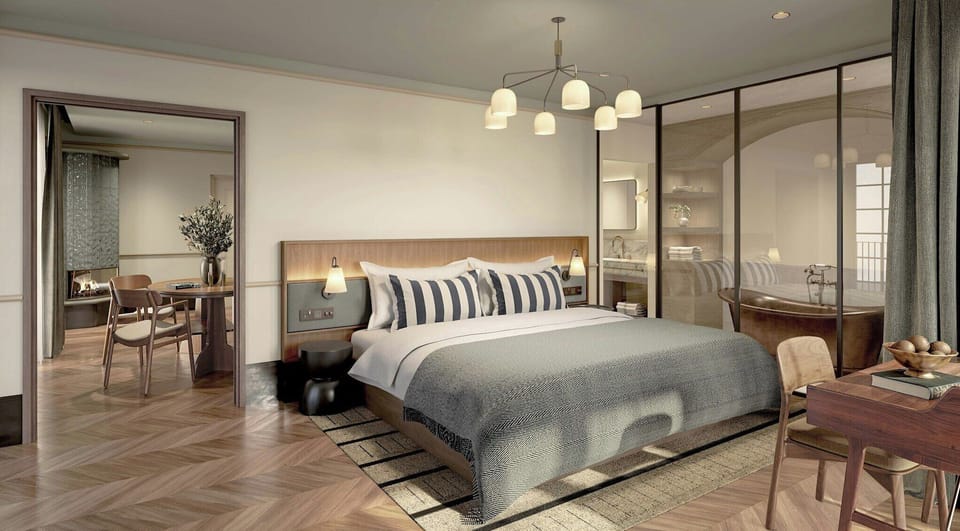 Deluxe Suite, Ocean View | Minibar, in-room safe, iron/ironing board (on request), bed sheets