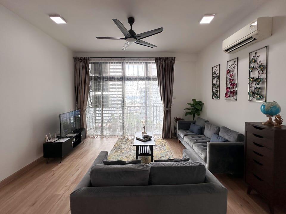 City Apartment, Ocean View | Living area | 55-inch flat-screen TV with cable channels