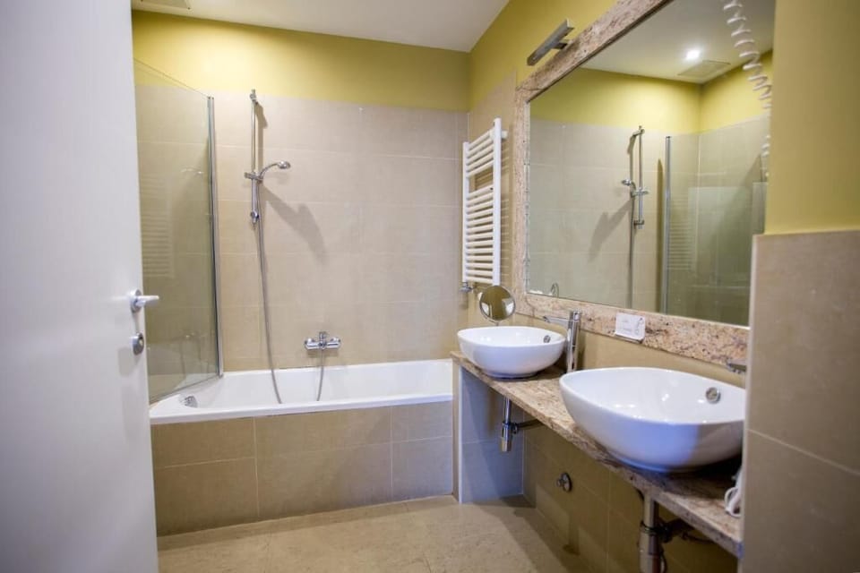 Triple Room, City View | Bathroom | Free toiletries, hair dryer, slippers, bidet