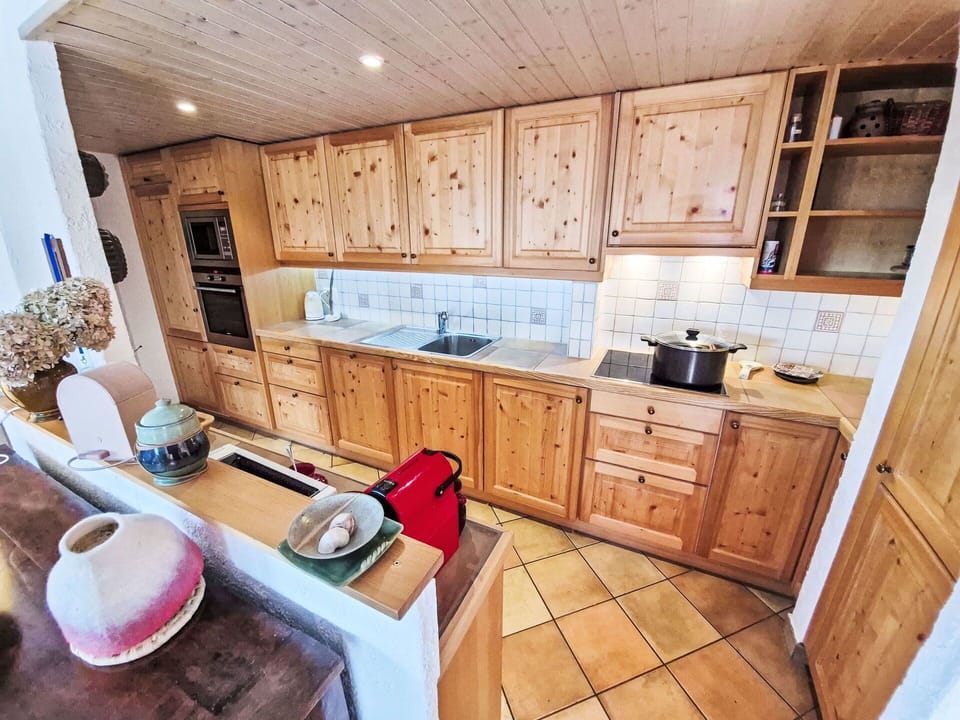 Kitchen, Countertop, Cabinetry, Furniture, Wood, Major Appliance, Kitchen Appliance, Interior Design, Kitchen Stove, Cupboard