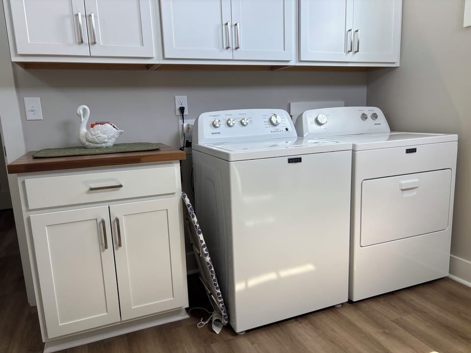 Washer, dryer in mud room.