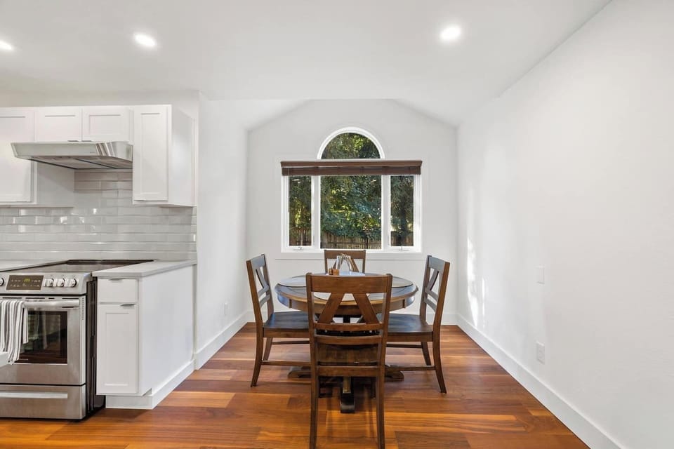 Kitchen dining nook with seating for four—perfect for breakfast or board games.