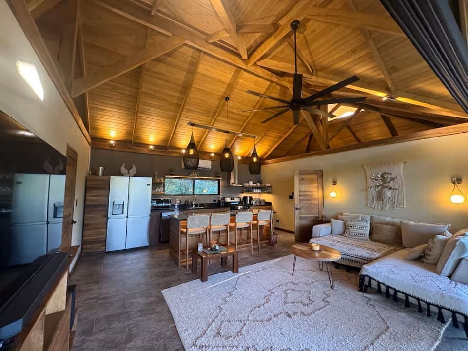 island that sits 8, a dining table for 10 on covered balcony, sleeper sofa