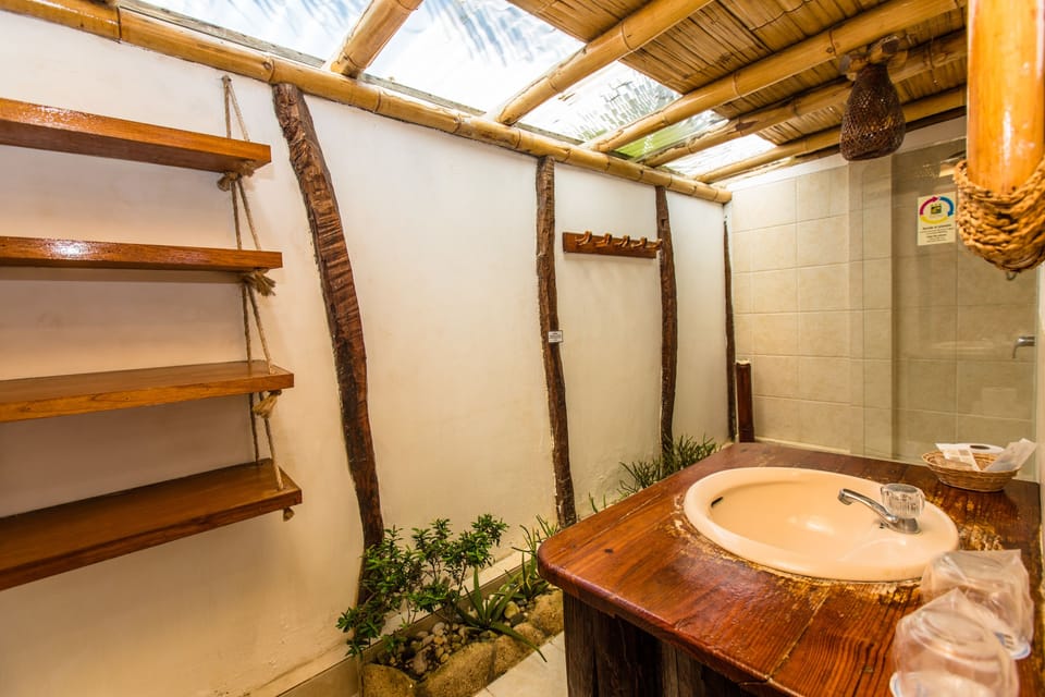 Bungalow, 2 Twin Beds, Terrace, Beach View | Bathroom | Shower, free toiletries, towels, shampoo