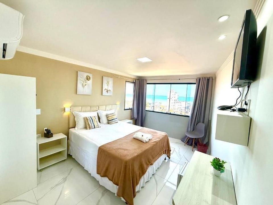 Deluxe Double Room, Partial Sea View | Iron/ironing board, free WiFi